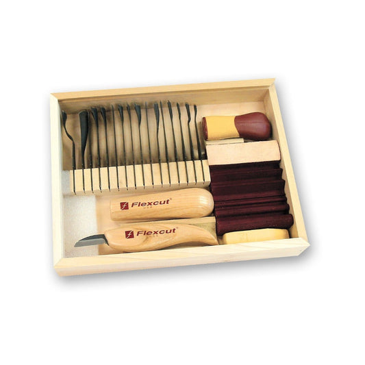 Picture of the starter set within its wooden box, segmented area's within the box to store blades, handle, knife and slipstrop and wax