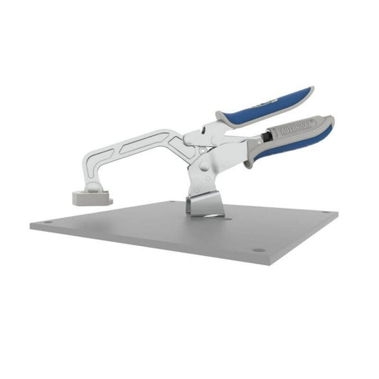 Kreg Heavy-Duty Bench Clamp System KBC3-HDSYS showing metal plate and automaxx 3inch clamp clipped into mounting hole. Plate has each corner drilled and countersunk for fixing to bench or table