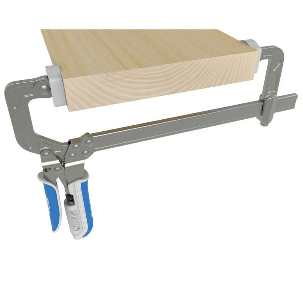 Kreg Auto-Adjust Bar Clamps showing a clamp, clamping a block of wood