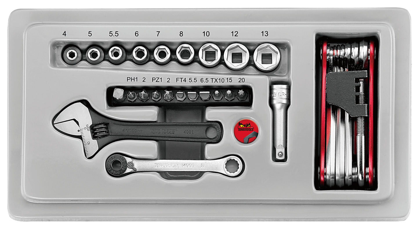 inside top lid set of sockets 4 to 13, adjustable wrench, set of hex keys and 1/4" drive bit set with reversable wrench
