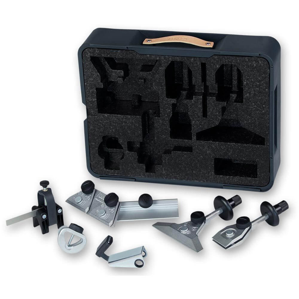 TORMEK HTK-806 HAND TOOL KIT showing each jig removed from its case. these jigs are SVM-45 Short Knife Jig, SVM-140 Long Thin Knife Jig, SVX-150 Scissor Jig, SVS-38 Short Tool Jig, SVA-170 Axe Grinding Kit and SVM-00 Small Knife Holder