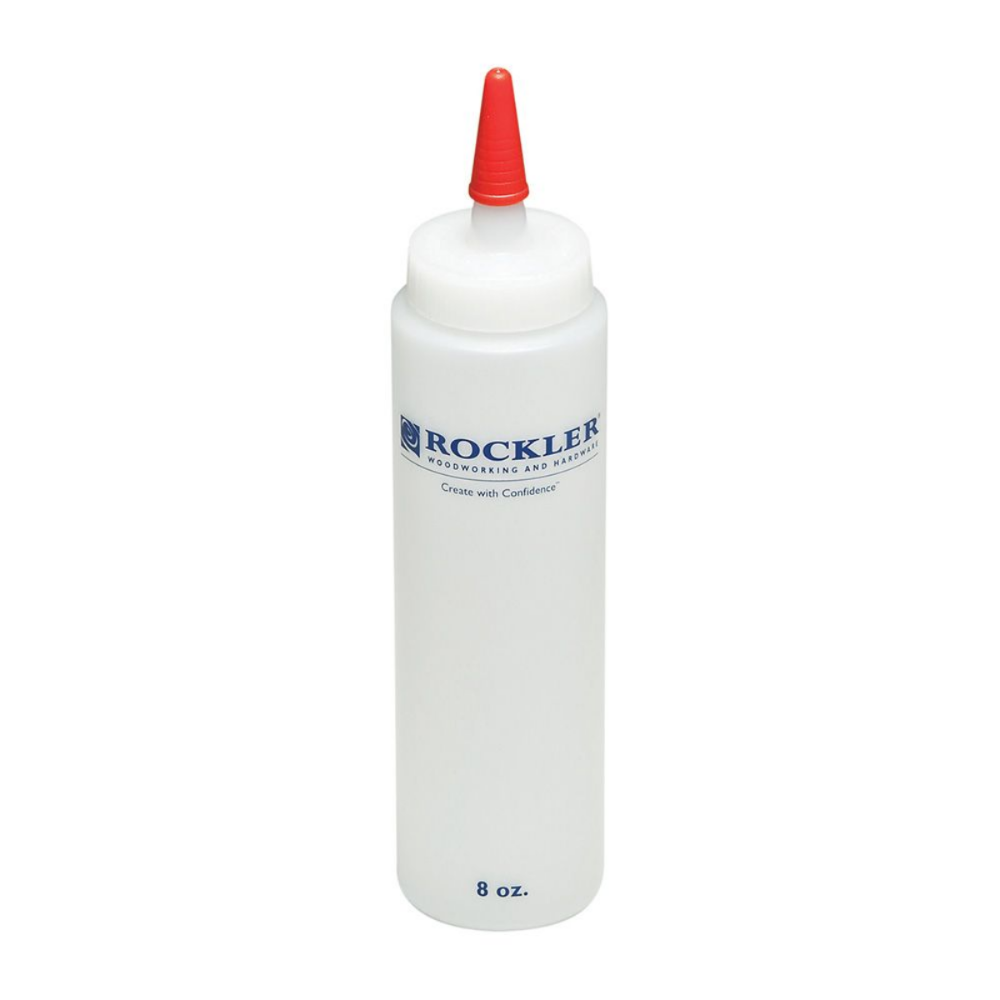 Rockler Glue Bottle with Standard Spout shown with red sealing cap.