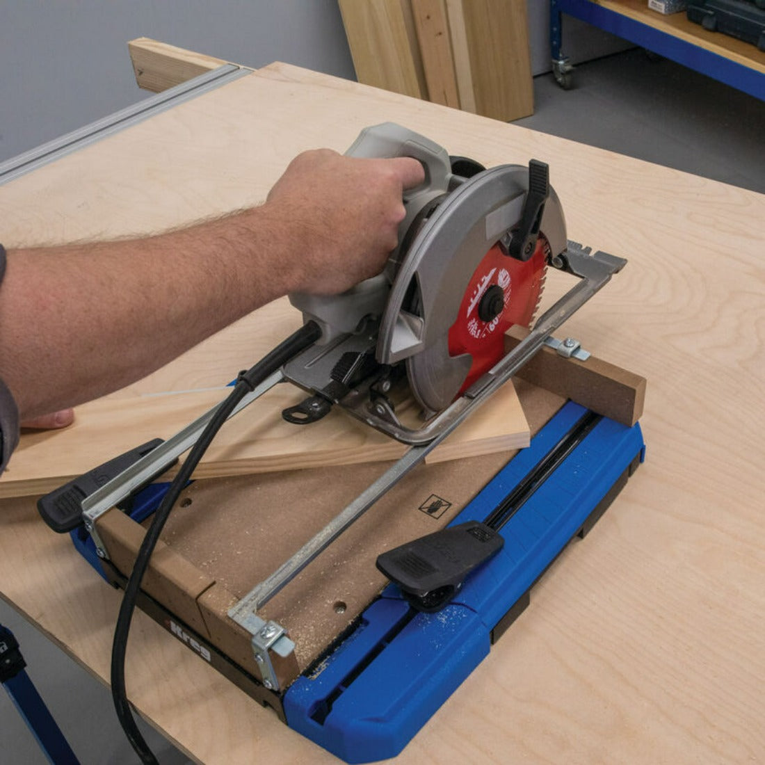 circular saw on the Kreg Crosscut Station KMA4100-INT sawing a piece of timber at 45 degrees