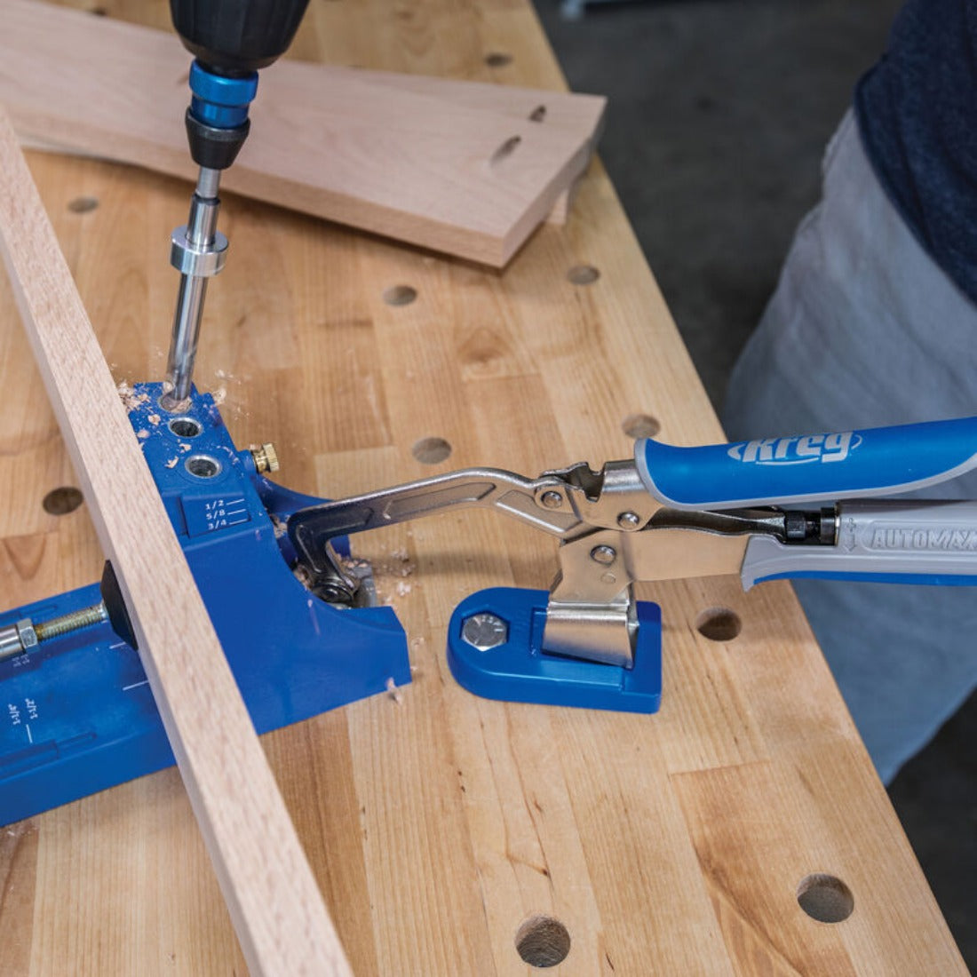 Kreg Bench Clamp with Bench Clamp Base image is showing K4 jig being held on a bench with the clamp 