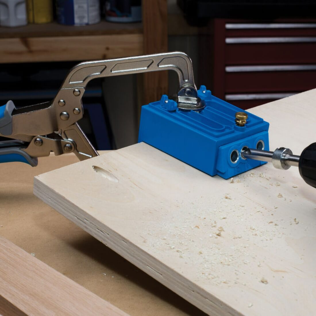 Kreg Automaxx 76mm Face Clamp holding a pocket jig while wood being drilled