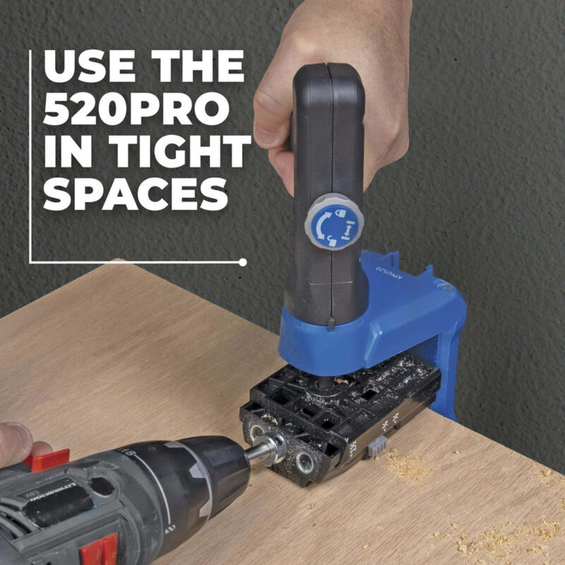 image shows the kreg 520pro handle swivelled into position and holding the jig in place while being drilled for pocket holes, text in image is "use the 520pro in tight spaces