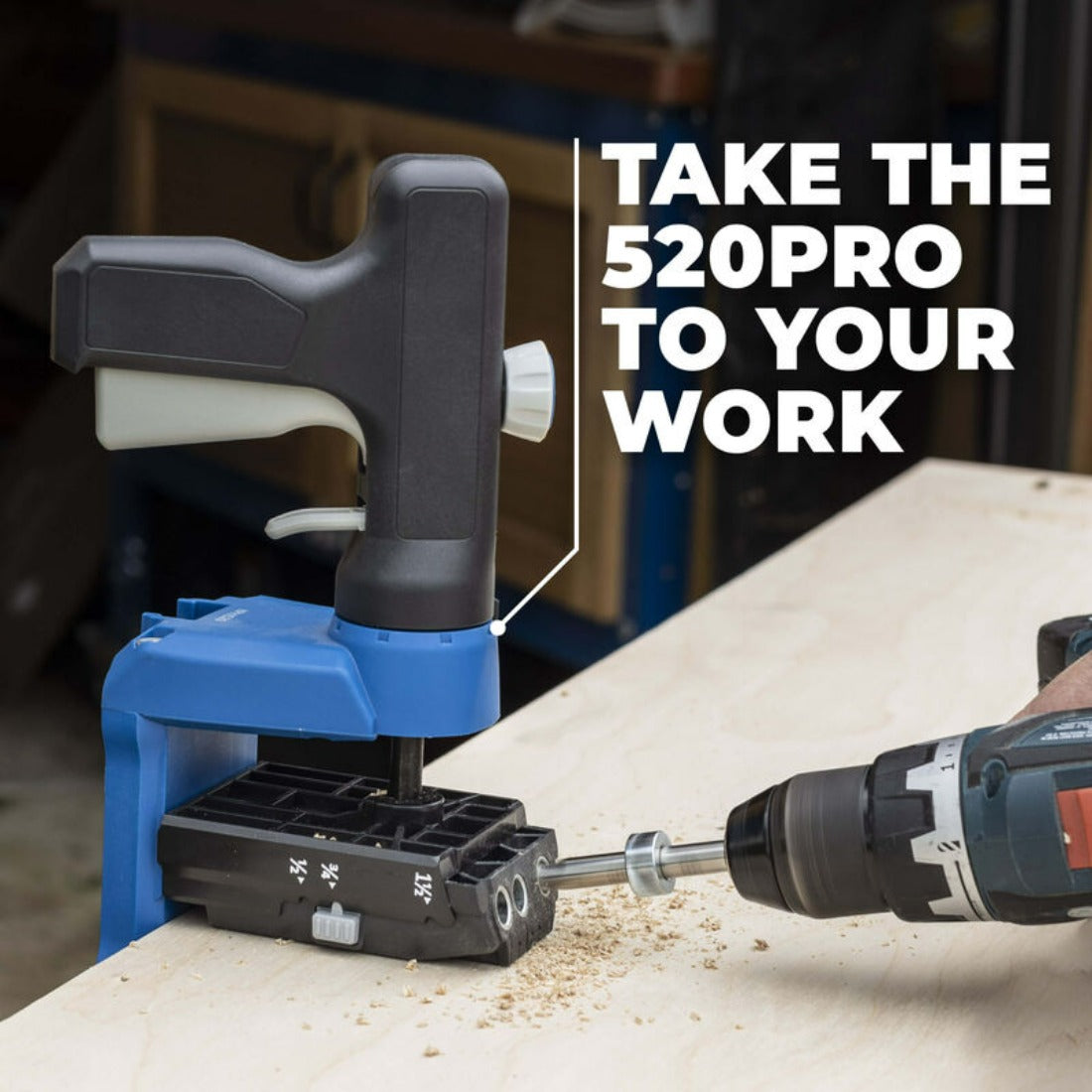 the 520pro jig is mounted to a flat sheet of timber for pocket drilled holes using a cordless drill. Description reads, "take the 520pro to your work"
