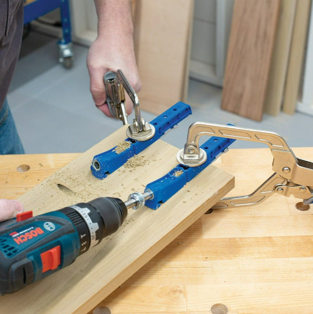 Kreg 320 jig shown as two single spaced jigs individually clamped to timber plank in readiness for pocket holes