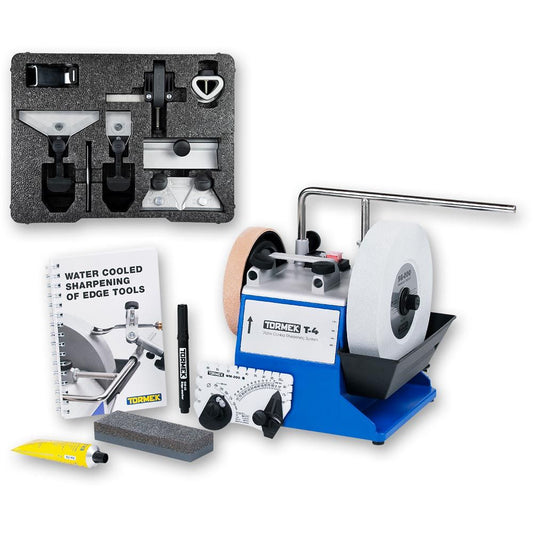 Tormek T-4 Water Cooled Sharpening System + HTK-806 Hand Tool Kit shown with the owners handbook, black marker pen, polishing paste, stone grader and angle master shown loose in front of the T-4. The tray of the hand tool jigs in a foam tray.