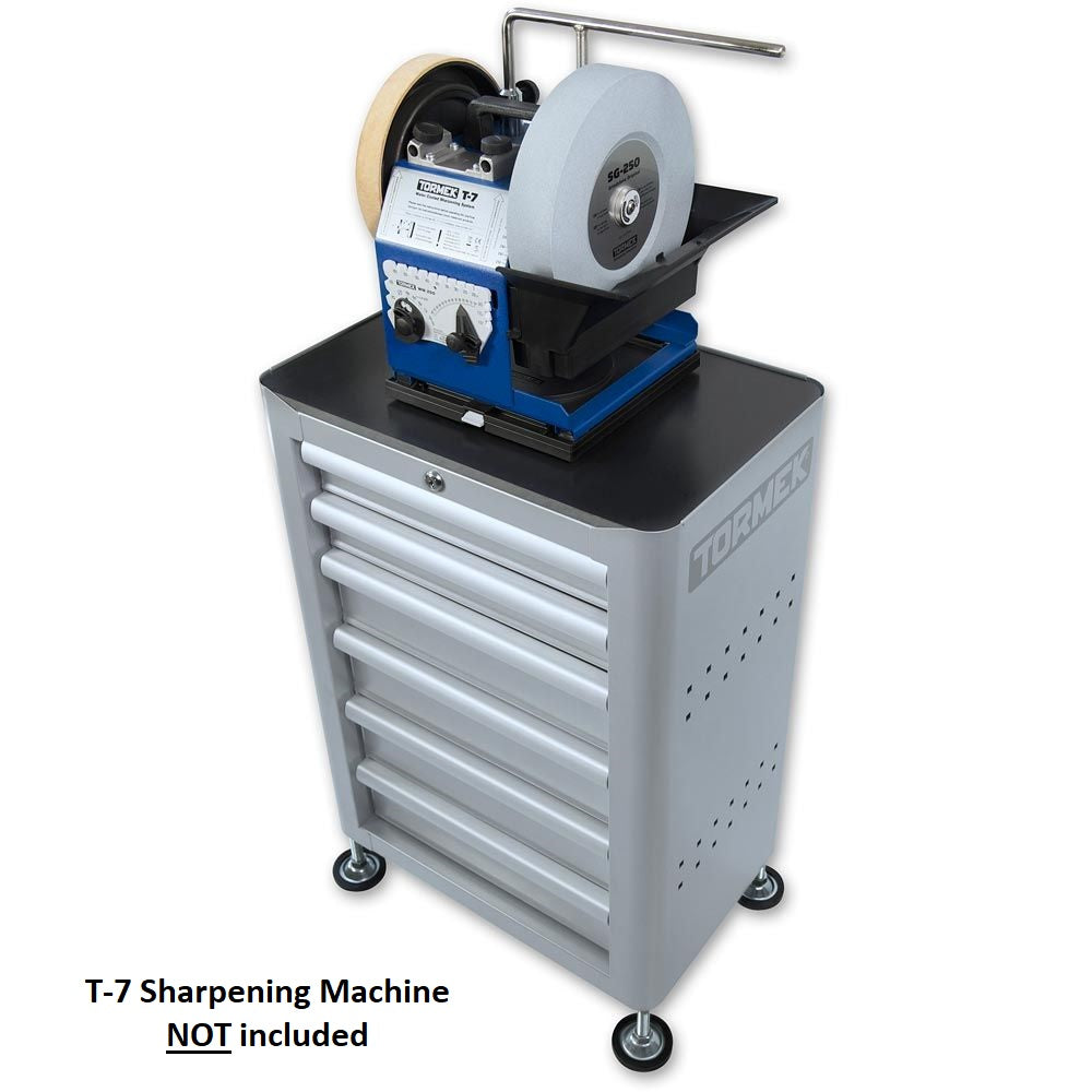 image from a side view of Tormek TS-740 sharpening station with height adjustable feet. 6 Drawers with lock at the top. Picture shows a T-7 on the station to showing proportions. T-7 not included in sale.