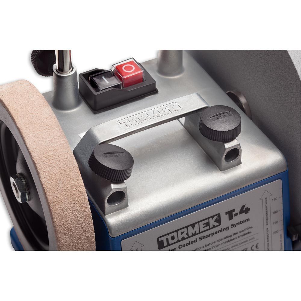 Tormek T-4 Water Cooled Sharpening System  from the top showing the carrying handle for the machine, on/off water resistant switch and the two locking thumb screws for the US-103 mount rail.