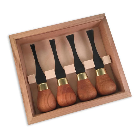 picture of the Flexcut 4pc premium wide palm set with the chisels separated with a wooden recessed bar holding each chisel. Contained in a wooden box with sliding lid.
