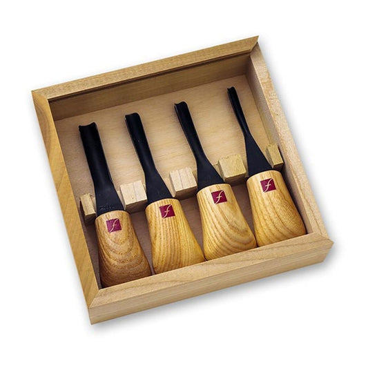 picture of the 4pc set in a wooden box. Box is segmented for each of the knives.